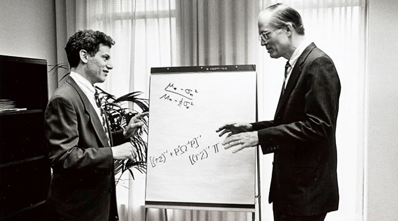 Robert Litterman and Fischer Black discussing a mathematical equation