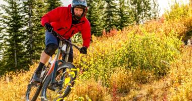 person on mountain bike on trail