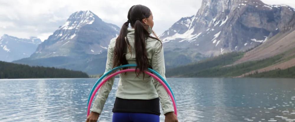 Indigenous girl by a lake