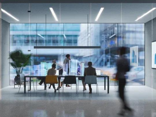 People in an office with glass walls